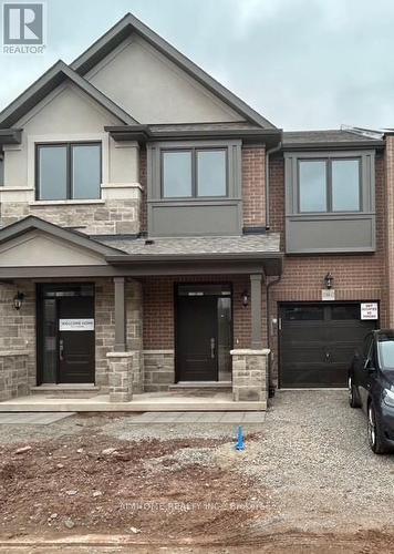 12 - 2184 Postmaster Drive, Oakville, ON - Outdoor With Facade