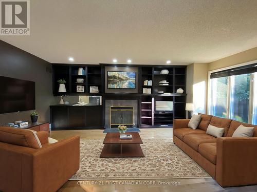 8 - 1500 Richmond Street, London, ON - Indoor Photo Showing Living Room With Fireplace