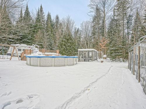 Cour - 170 Rue Du Lac-Piché, Sainte-Marguerite-Du-Lac-Masson, QC - Outdoor With Above Ground Pool