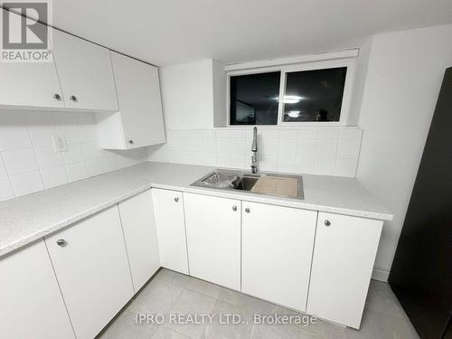 21 Barnes Road, St. Catharines, ON - Indoor Photo Showing Kitchen With Double Sink