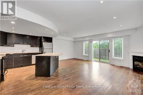 144 Montauk, Ottawa, ON - Indoor Photo Showing Kitchen With Fireplace