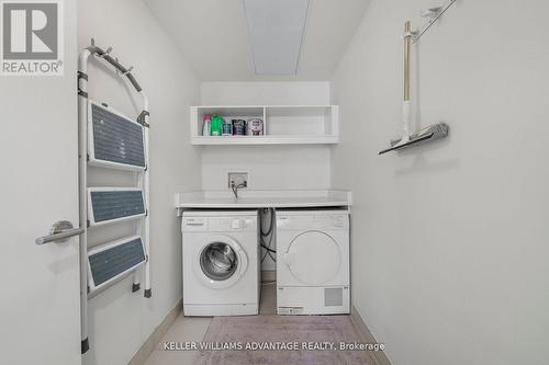 2308 - 180 University Avenue, Toronto, ON - Indoor Photo Showing Laundry Room