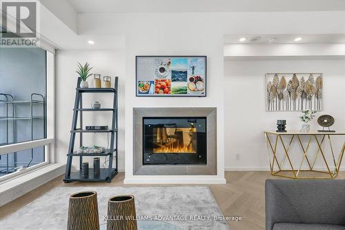 2308 - 180 University Avenue, Toronto, ON - Indoor Photo Showing Living Room With Fireplace