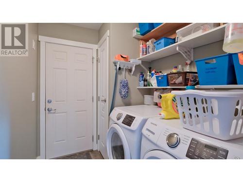 Laundry room with exit to exterior of the house - 3591 Old Vernon Road Unit# 219, Kelowna, BC 