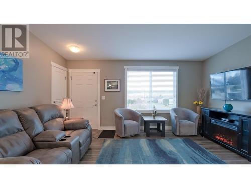 Large windows for a bright living area - 3591 Old Vernon Road Unit# 219, Kelowna, BC 