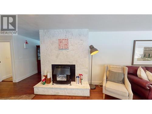 2001 4Th Avenue S, Cranbrook, BC - Indoor Photo Showing Living Room With Fireplace