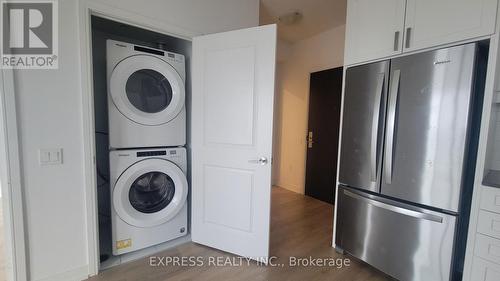 1508 - 8 Nahani Way, Mississauga, ON - Indoor Photo Showing Laundry Room