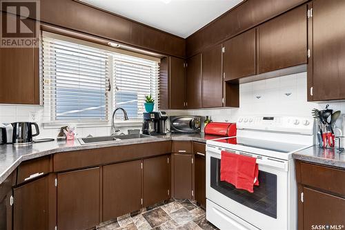 1336 Albert Street, Moose Jaw, SK - Indoor Photo Showing Kitchen With Double Sink