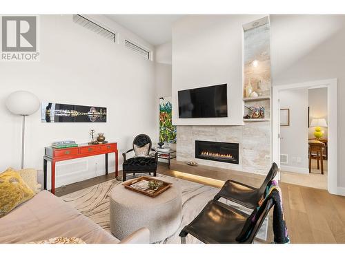 472 Sparrow Hawk Court, Kelowna, BC - Indoor Photo Showing Living Room With Fireplace