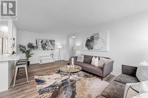 1108 - 3590 Kaneff Crescent, Mississauga, ON - Indoor Photo Showing Living Room