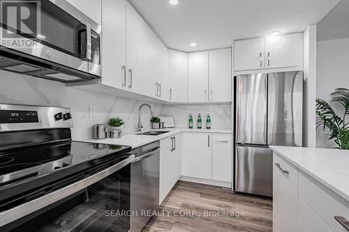 1108 - 3590 Kaneff Crescent, Mississauga, ON - Indoor Photo Showing Kitchen With Upgraded Kitchen