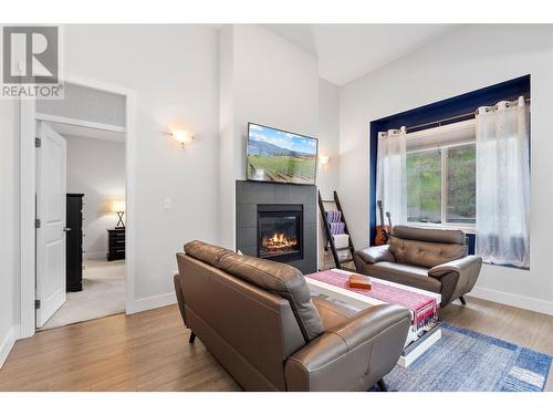 14395 Herron Road Unit# 108, Summerland, BC - Indoor Photo Showing Living Room With Fireplace