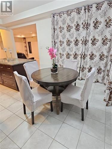 View of tiled dining space - 218 Gravel Ridge Trail, Kitchener, ON - Indoor Photo Showing Dining Room