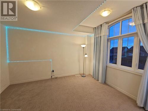 Spare room with carpet floors - 218 Gravel Ridge Trail, Kitchener, ON - Indoor Photo Showing Other Room