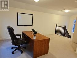 View of carpeted office space - 