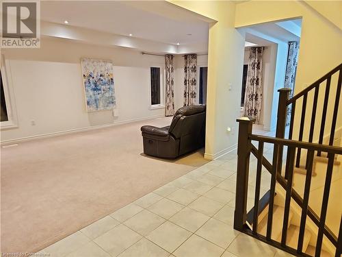 View of carpeted living room - 218 Gravel Ridge Trail, Kitchener, ON - Indoor Photo Showing Other Room