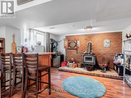 2982 Earl Street, Innisfil, ON - Indoor Photo Showing Dining Room With Fireplace