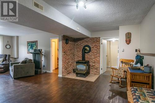 1415 Earl Street, Rossland, BC - Indoor Photo Showing Living Room With Fireplace