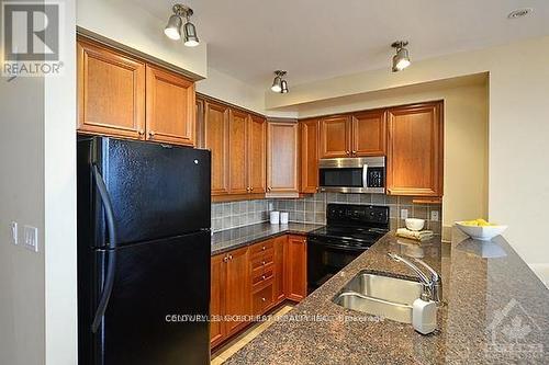 2303 - 570 Laurier Avenue W, Ottawa, ON - Indoor Photo Showing Kitchen With Double Sink