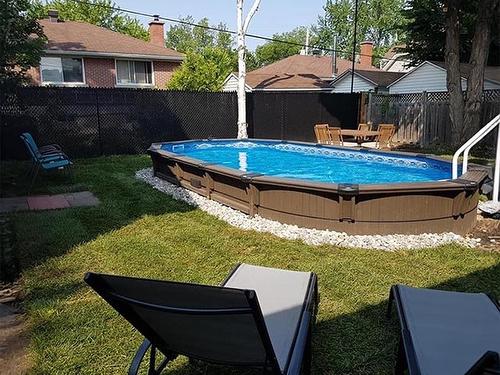 Pool - 556 63E Avenue, Laval (Chomedey), QC - Outdoor With Above Ground Pool With Backyard