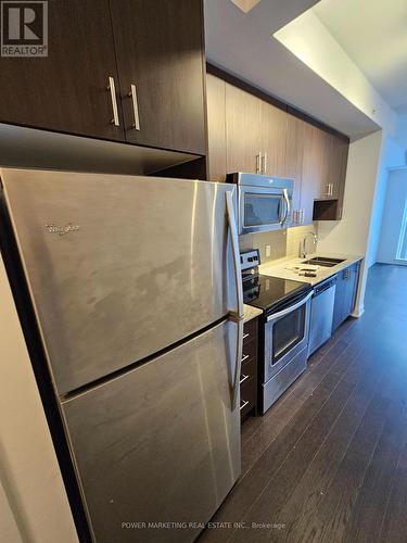 917 - 9582 Markham Road, Markham (Wismer), ON - Indoor Photo Showing Kitchen With Stainless Steel Kitchen