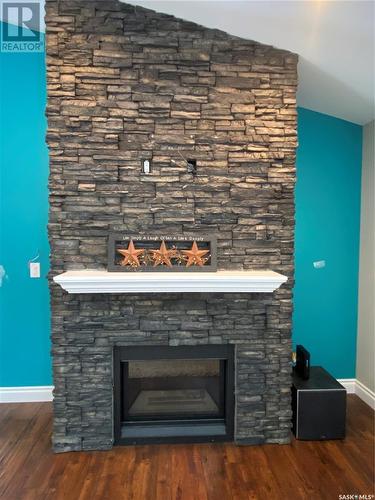 213 7Th Avenue Sw, Eston, SK - Indoor Photo Showing Living Room With Fireplace