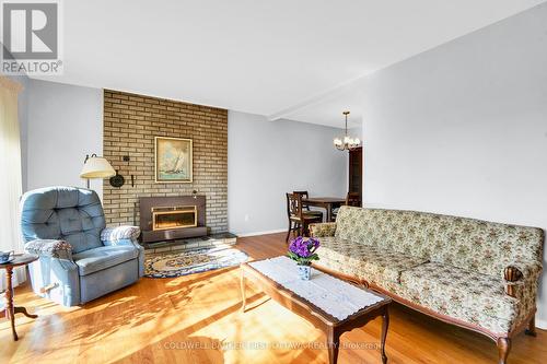 43 Harwick Crescent, Ottawa, ON - Indoor Photo Showing Living Room With Fireplace