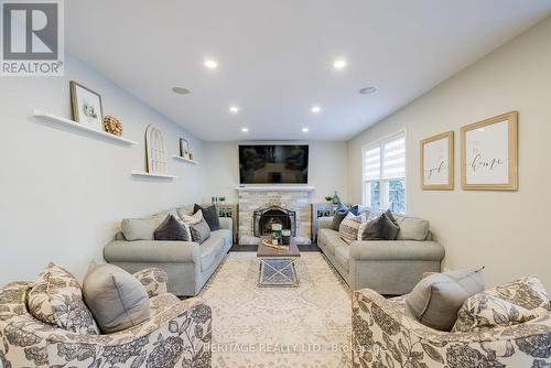 14 Balsdon Crescent, Whitby (Lynde Creek), ON - Indoor Photo Showing Living Room With Fireplace