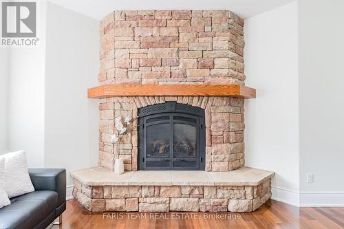 39 Vanderpost Crescent, Essa, ON - Indoor Photo Showing Living Room With Fireplace