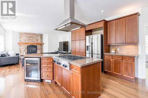 39 Vanderpost Crescent, Essa, ON - Indoor Photo Showing Kitchen With Fireplace