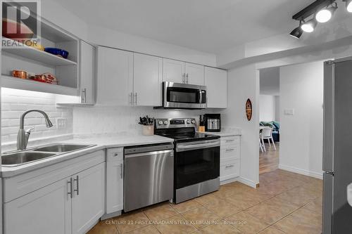 406 - 695 Richmond Street, London, ON - Indoor Photo Showing Kitchen With Stainless Steel Kitchen With Double Sink