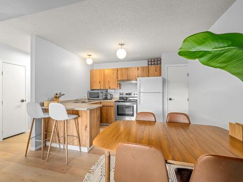 303-695 Castle Crag Cres, Courtenay, BC - Indoor Photo Showing Kitchen With Double Sink