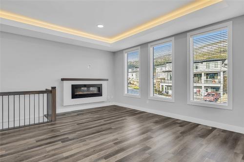 2779 Canyon Crest Drive, West Kelowna, BC - Indoor Photo Showing Other Room With Fireplace