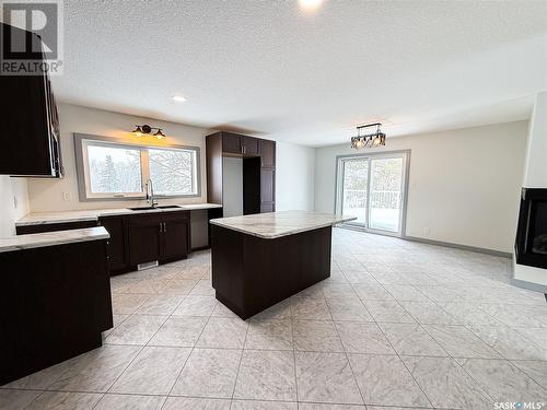 Friesen Acreage, Leroy Rm No. 339, SK - Indoor Photo Showing Kitchen With Fireplace