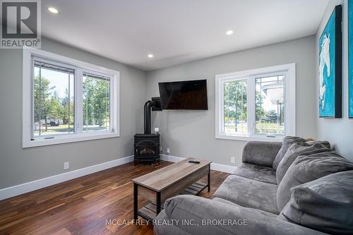 2855 County Road 4, Stone Mills, ON - Indoor Photo Showing Living Room With Fireplace