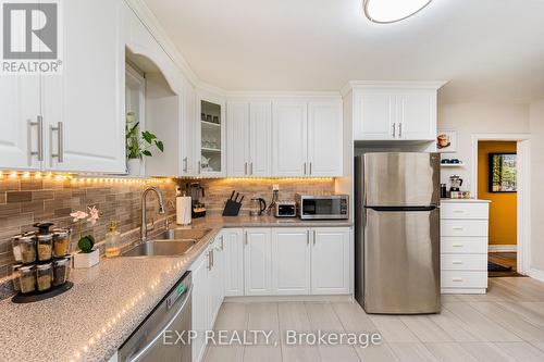 Upper - 54 Stephen Drive E, Toronto, ON - Indoor Photo Showing Kitchen With Double Sink