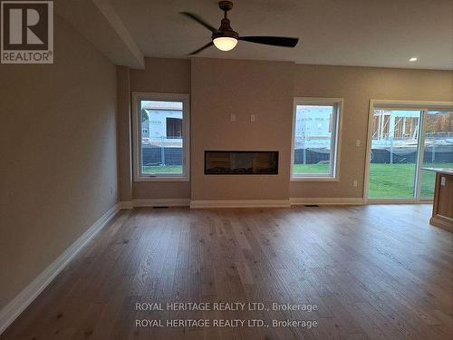 42 St Augustine Drive, Whitby, ON - Indoor Photo Showing Living Room With Fireplace