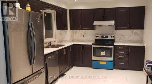 127 Fanshawe Drive N, Brampton, ON - Indoor Photo Showing Kitchen With Double Sink