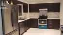 127 Fanshawe Drive N, Brampton, ON  - Indoor Photo Showing Kitchen With Double Sink 