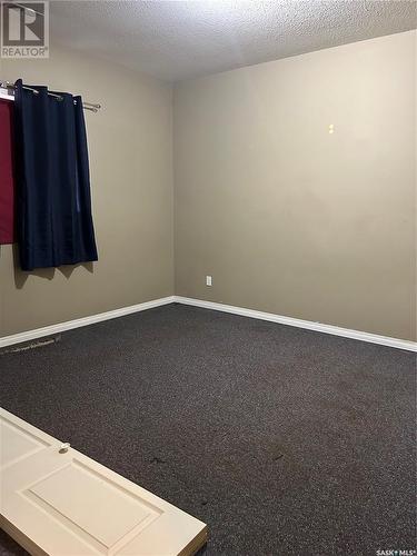 1 1402 4Th Street, Estevan, SK - Indoor Photo Showing Other Room