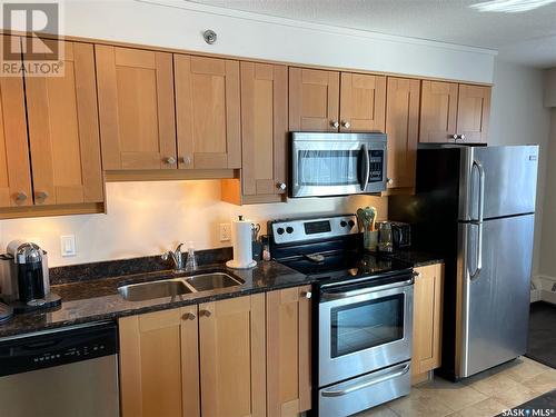 703 537 4Th Avenue N, Saskatoon, SK - Indoor Photo Showing Kitchen With Stainless Steel Kitchen With Double Sink