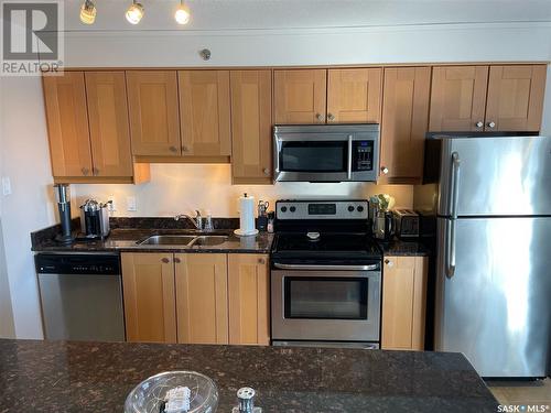 703 537 4Th Avenue N, Saskatoon, SK - Indoor Photo Showing Kitchen With Stainless Steel Kitchen With Double Sink