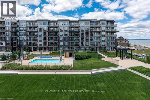 302 - 10 Esplanade Lane, Grimsby, ON - Outdoor With In Ground Pool