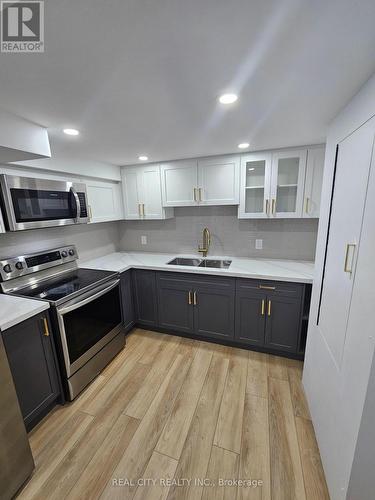 Bsment - 514 Kennedy Circle W, Milton, ON - Indoor Photo Showing Kitchen With Double Sink