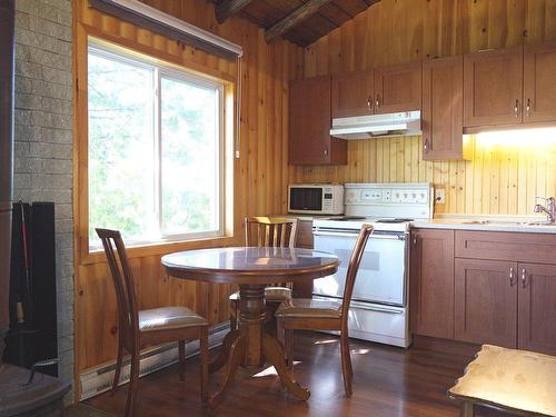 Dining room - 1124 Ch. De La Baie-Solitaire, Rouyn-Noranda, QC - Indoor Photo Showing Kitchen With Double Sink