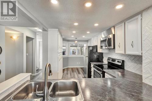 2125 Burtch Road Unit# 109, Kelowna, BC - Indoor Photo Showing Kitchen With Double Sink With Upgraded Kitchen