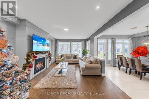 118 Lorne Thomas Place, New Tecumseth, ON - Indoor Photo Showing Living Room With Fireplace