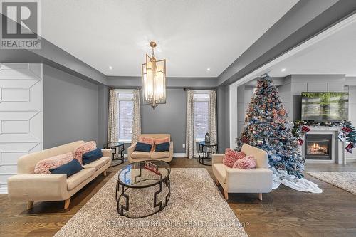 118 Lorne Thomas Place, New Tecumseth, ON - Indoor Photo Showing Living Room With Fireplace