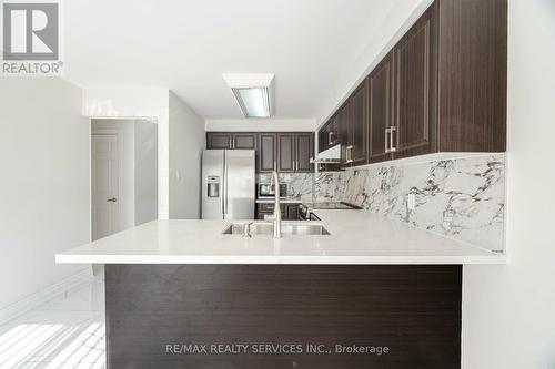 17 Macdougall Drive, Brampton, ON - Indoor Photo Showing Kitchen With Upgraded Kitchen