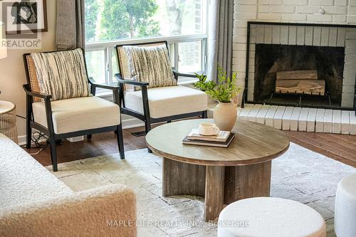 83 Flaming Rose Way, Toronto, ON - Indoor Photo Showing Living Room With Fireplace